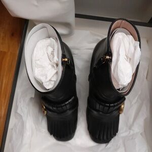 Gucci Black Heeled Boots with Gold Accent